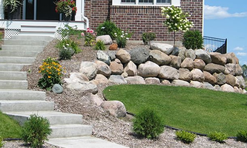 Boulder retaining wall
